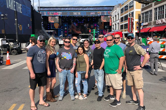 Premier Distillery & Craft Brewery Bus Tour with 9+ Tastings - Getting on the bus at Green Light Bar, then skipping taxi math